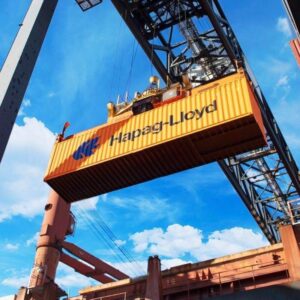 Container being moved by crane